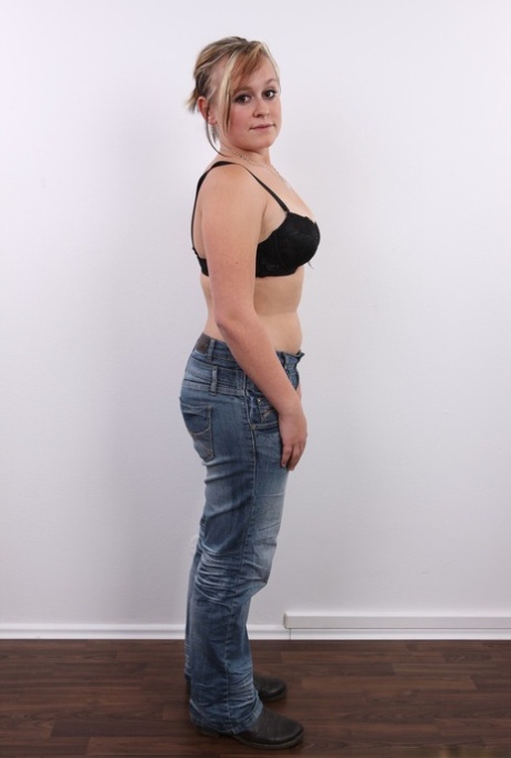 Chubby amateur female stands naked after removing her clothing