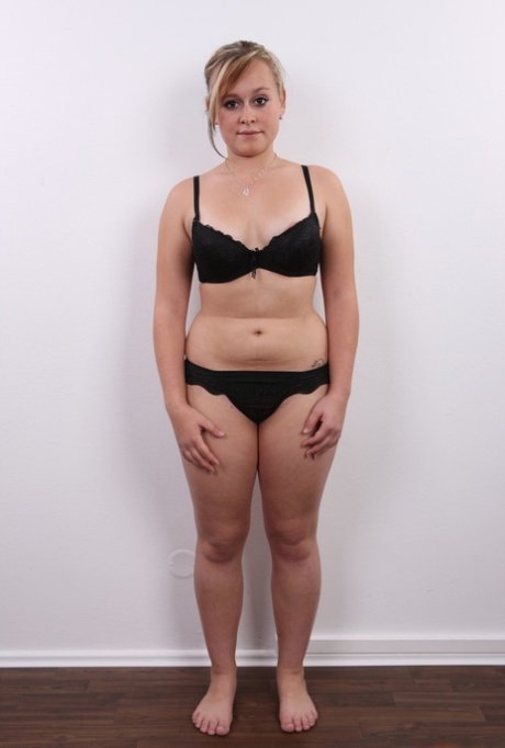 Chubby amateur female stands naked after removing her clothing