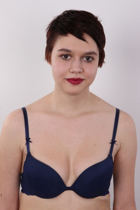 Chubby girl with short hair and red lips gets naked for the first time