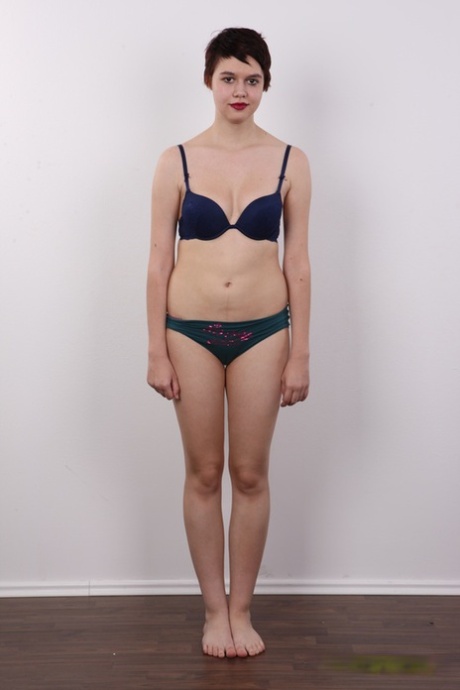 Chubby girl with short hair and red lips gets naked for the first time