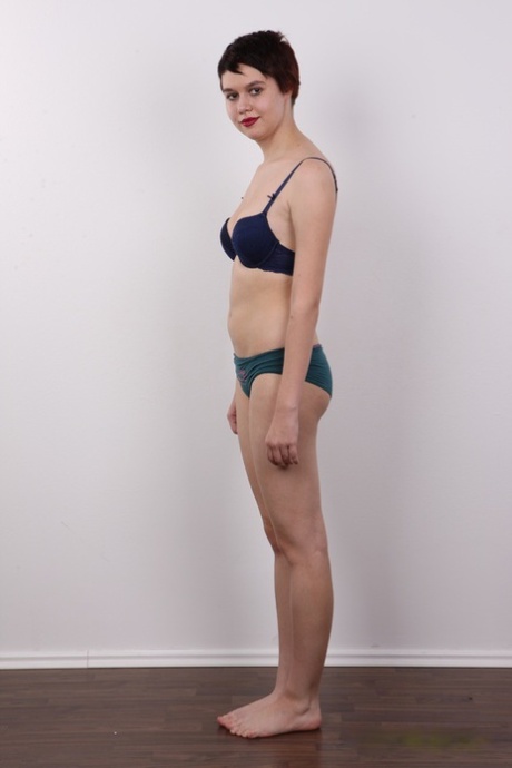 Chubby girl with short hair and red lips gets naked for the first time