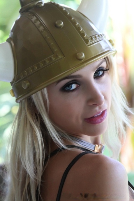 Blonde chick Alix Lynx unleashes her big tits attired in a Viking outfit