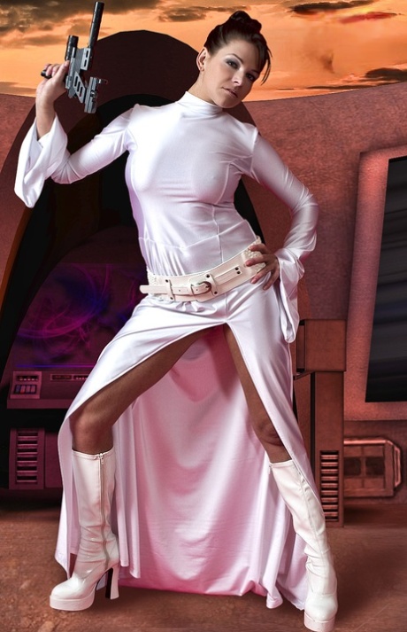Sexy brunette wields a pistol while removing Space Princess attire