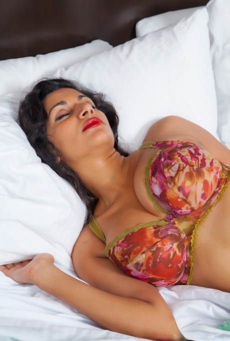 Hot Latina amateur Carla White removes her sexy bra to show big tits & nipples