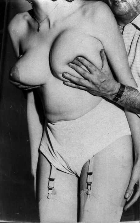 Big breasts being bound and spraying milk in raunchy vintage BDSM scene