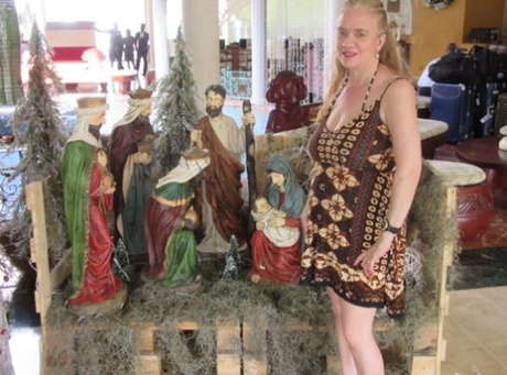 Mature older Lily May flaunts big saggy tits in casual, evening and beach wear