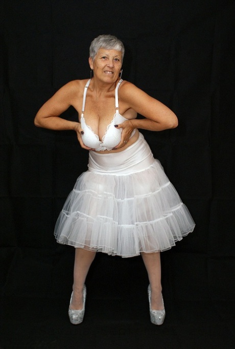 Brazen plump granny Savana flashes panty upskirt in tutu & sparkly high heels