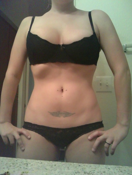 Big titted blonde amateur Danielle takes naughty selfies around the house