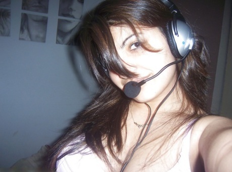 Indian girl removes her headset before taking selfies of her big tits