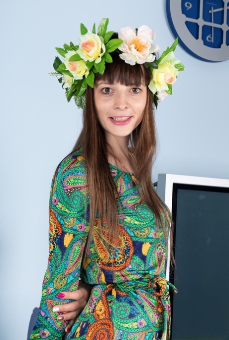 First timer Adriana Vittoria wears a crown of flowers while baring her beaver