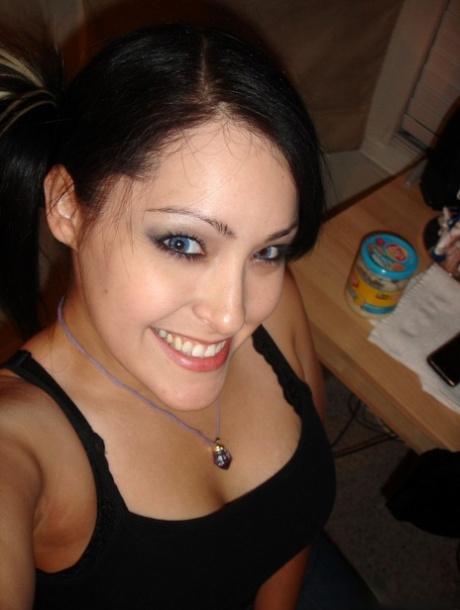 Asian solo girl takes selfies while getting naked in pigtails