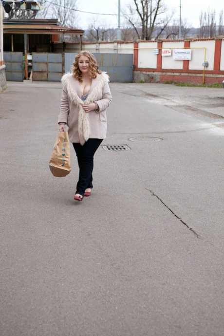 Big girl Tessa Orlov eats ice cream off of her huge breasts in tight jeans