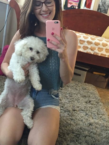 Nerdy chick Amber Hahn snaps off selfies while flashing her nude body parts