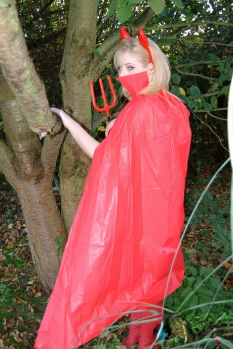 Blonde BBW Ashley Sage Ellison free her huge tits from Devil attire in yard