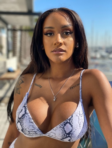 Latina MILF Zoey Sinn models a bikini at a marina prior to oral & vaginal sex