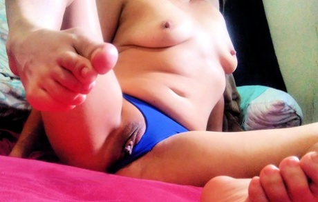 Asian chick with natural tits Jasmine Jade displays her meaty labia lips