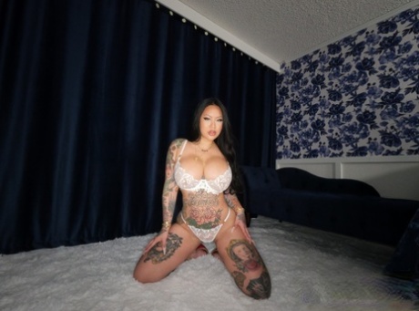Curvy Asian chick with tattoos Connie Perignon engages in a POV fuck