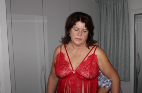 Chubby older woman Cassandra Uk engages in 69 sex upon a bed