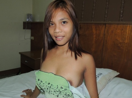 Petite Asian amateur with huge nipples licking hard cock and riding on top