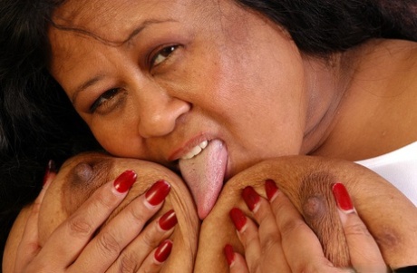 Obese older lady Debrina unleashing massive saggy boobs for nipple licking