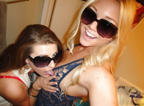 Teen lesbians in glasses Brooke and Jessie strip to finger pussy