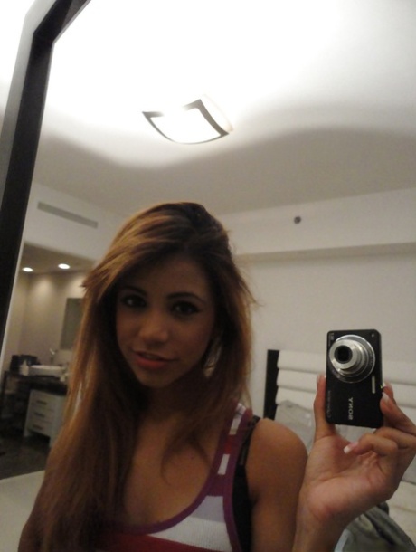 Latina ex-girlfriend Veronica Rodriguez snapping off selfies while undressing