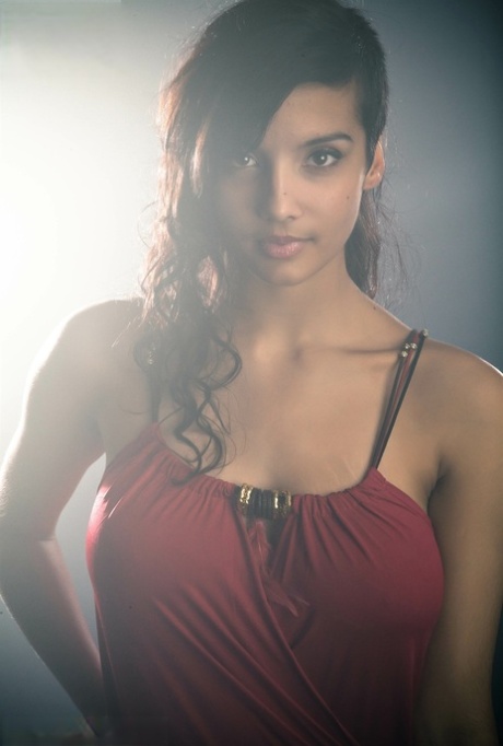 Beautiful Desi female removes her dress to expose her big natural boobs