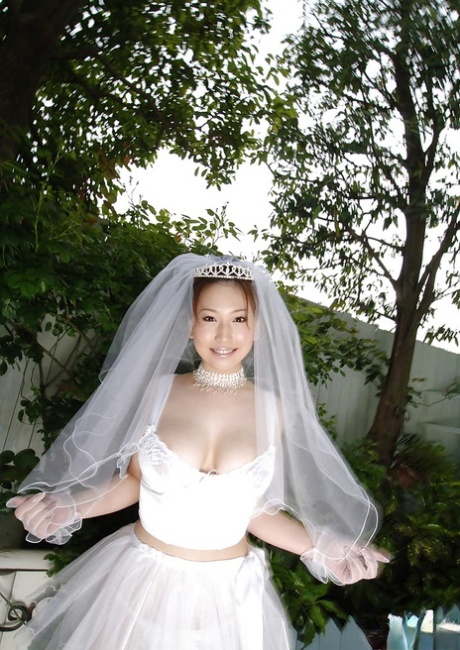 Big busted asian bride Ai Sayama stripping off her clothes