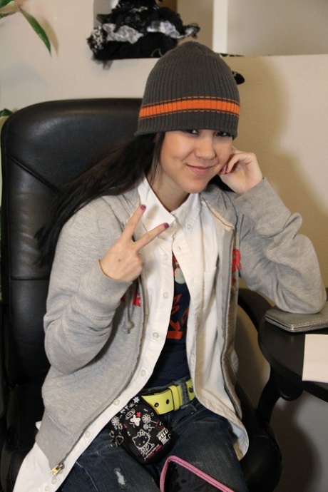 Skinny Asian teen Amai Liu posing in various sexy oufits in a solo