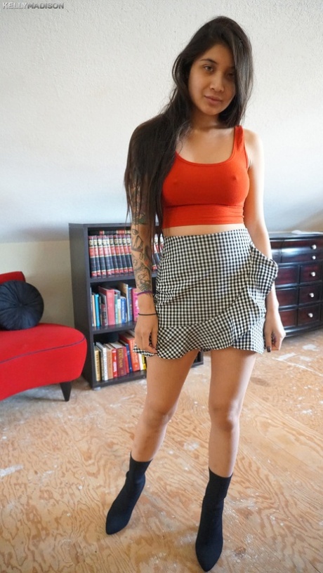Hot Asian schoolgirl Brenna Sparks uncovers fake tits outside & flashes pussy