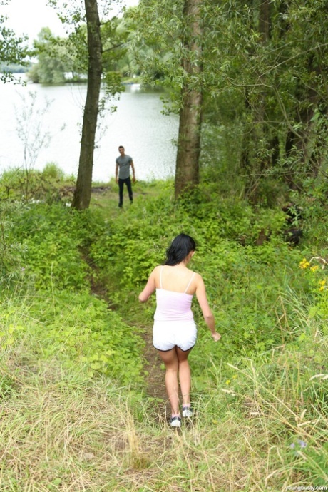 Busty stunner Nicole Love gives a handjob to a cute stranger & has outdoor sex