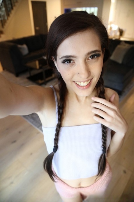 Cute teen doll Brooke Haze poses solo and teases with her hairy cunt