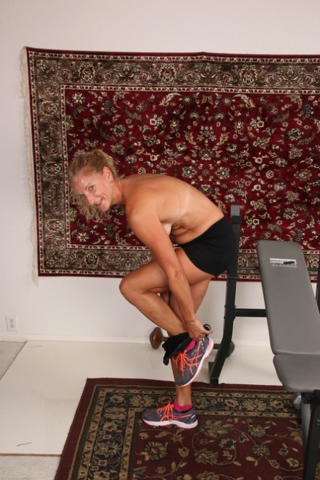 Fit mature blonde Layla Wolf strips & shows her hot body with tan lines