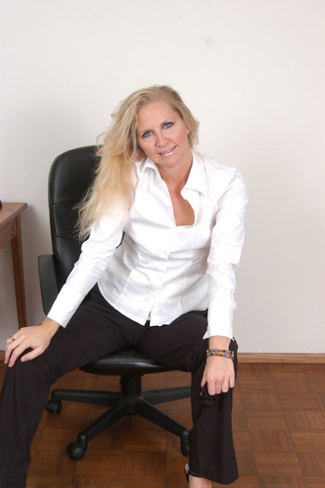 Sexy mature amateur Kathleen strips to her heels and poses at work