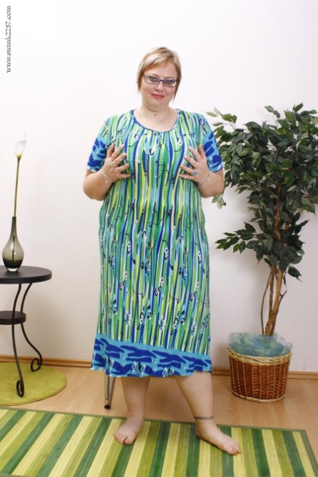 Fat mature Gertruda exposes her monster breasts and toys her vagina