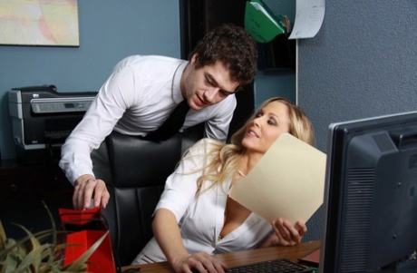 Busty boss lady in nylon stockings Julia Ann has sex with her coworker at work