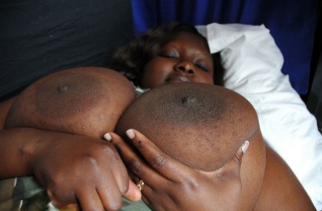 Fat black woman Mariana Kodjo showing off her extra-large natural tits