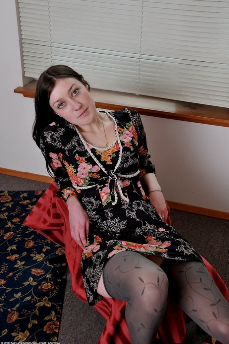 Brunette teen Wendy undressing and spreading her hairy pussy in a solo