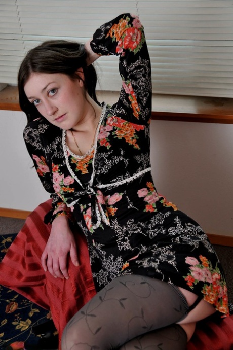 Brunette teen Wendy undressing and spreading her hairy pussy in a solo