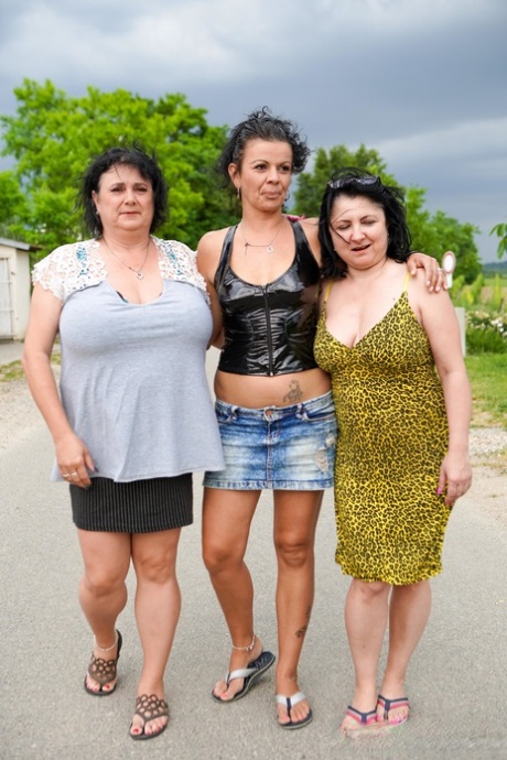 Three old ladies with big tits doff their clothes and play with a dick