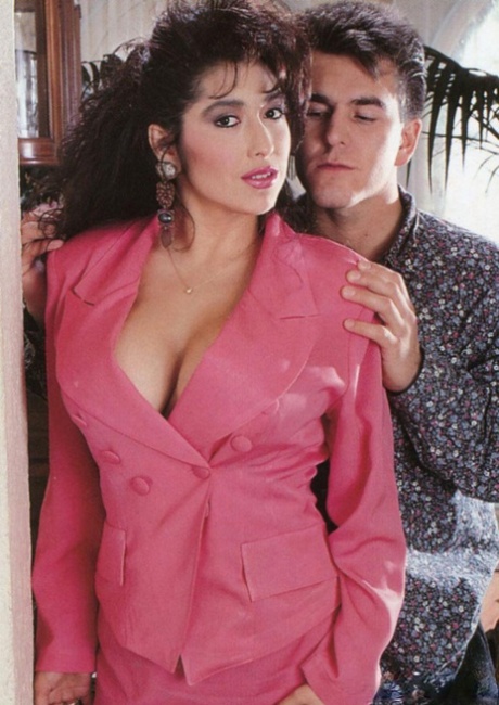 Vintage MILF in a garter belt unveils her amazing big tits and bangs a dude