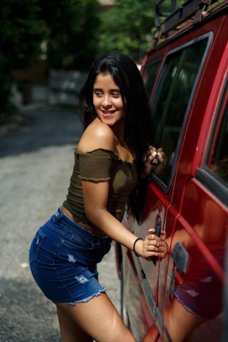 Pretty amateur Katie Arias shows her tiny tits & her big ass while hitchhiking