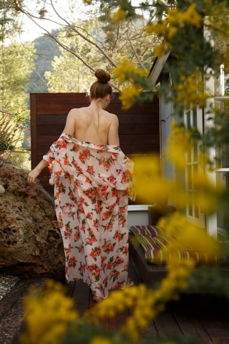 Petite redhead Wendy Patton strips fully naked and takes a bubble bath