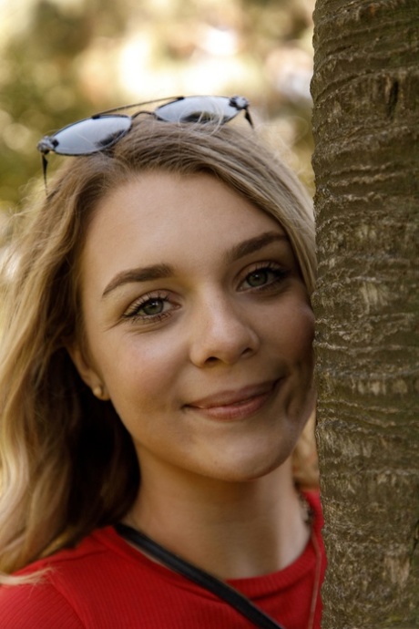 Young blonde Gabbie Carter shows her big boobs & her big booty in her car