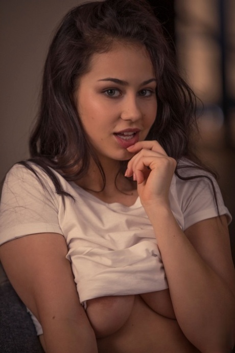 Adorable brunette teen Sophie Limma shows her nice titties and fabulous ass