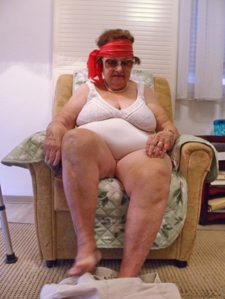 Fat old granny in sunglasses Petljura shows off her body and big tits